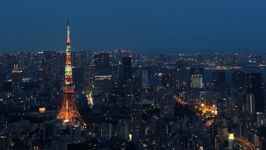 a view of a city at night with the lights on